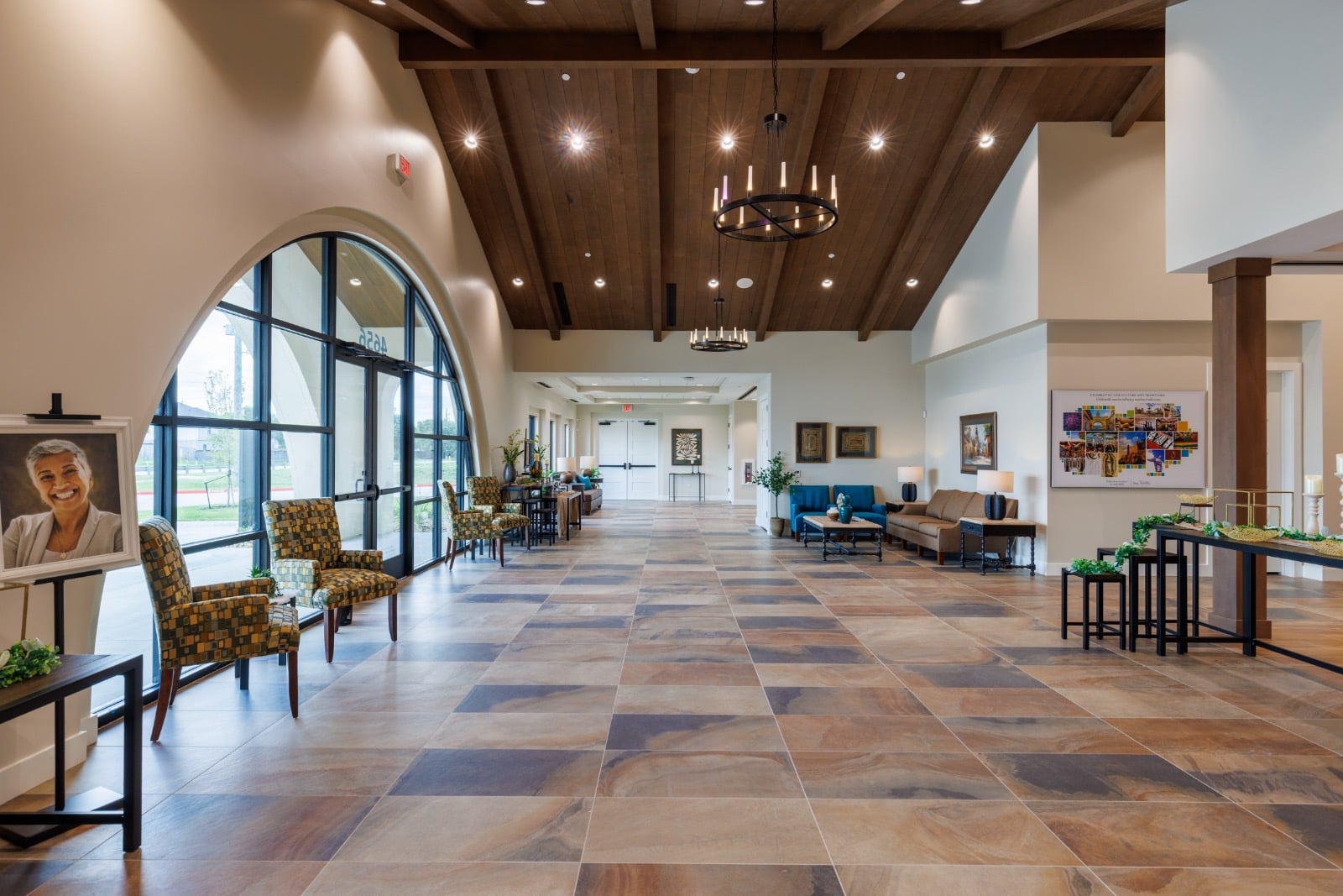 Arched lobby with large-format stone-look tile